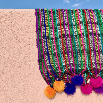 Go to Guatemalan hand-woven cloth pom-pom stallpera 